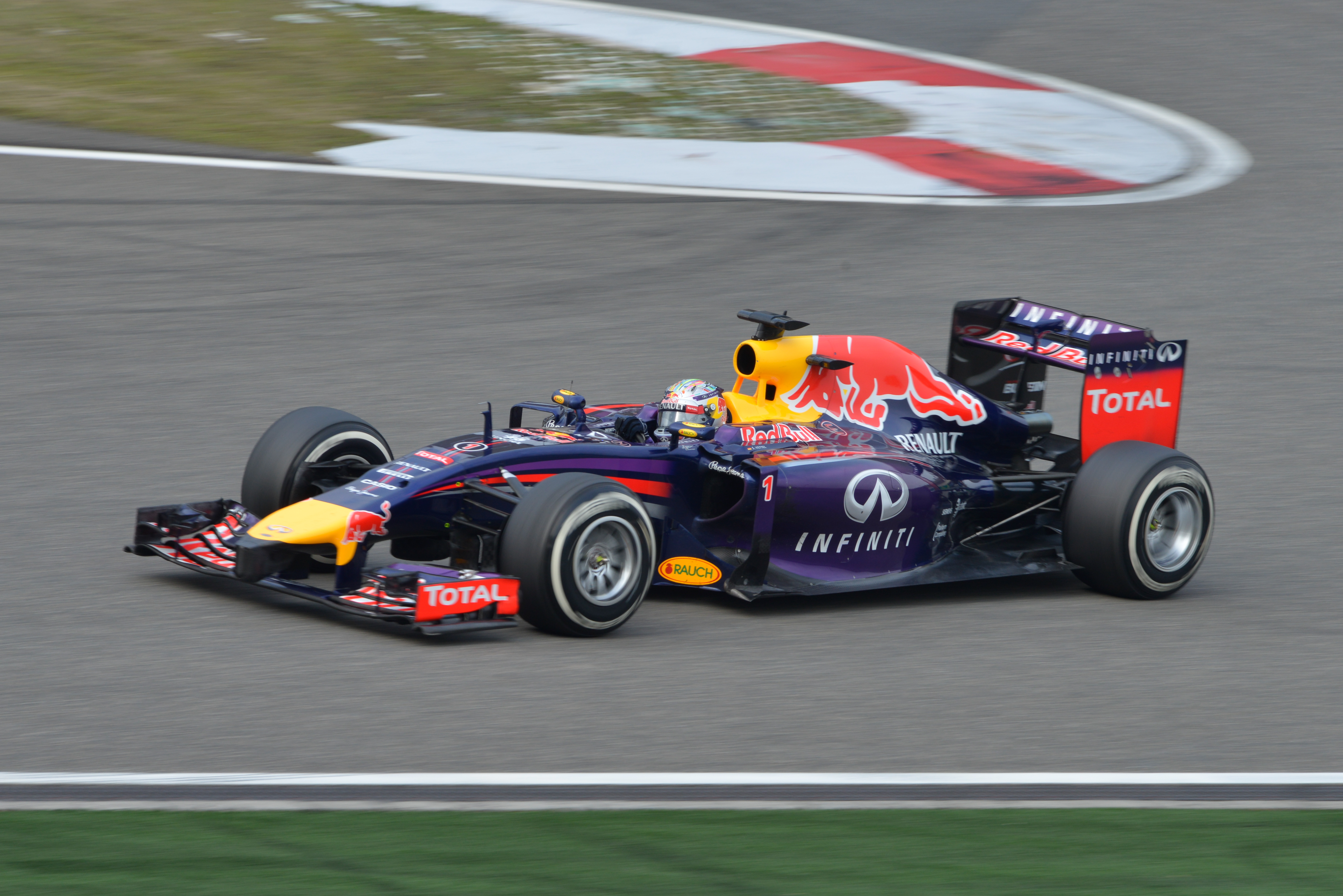 Sebastian Vettel driving the 2014 Red Bull RB10